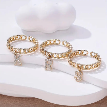 Anel Pendente com Brilhante