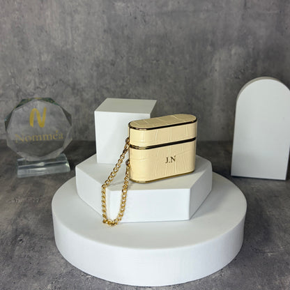 Capa AirPods Croc com detalhe dourado