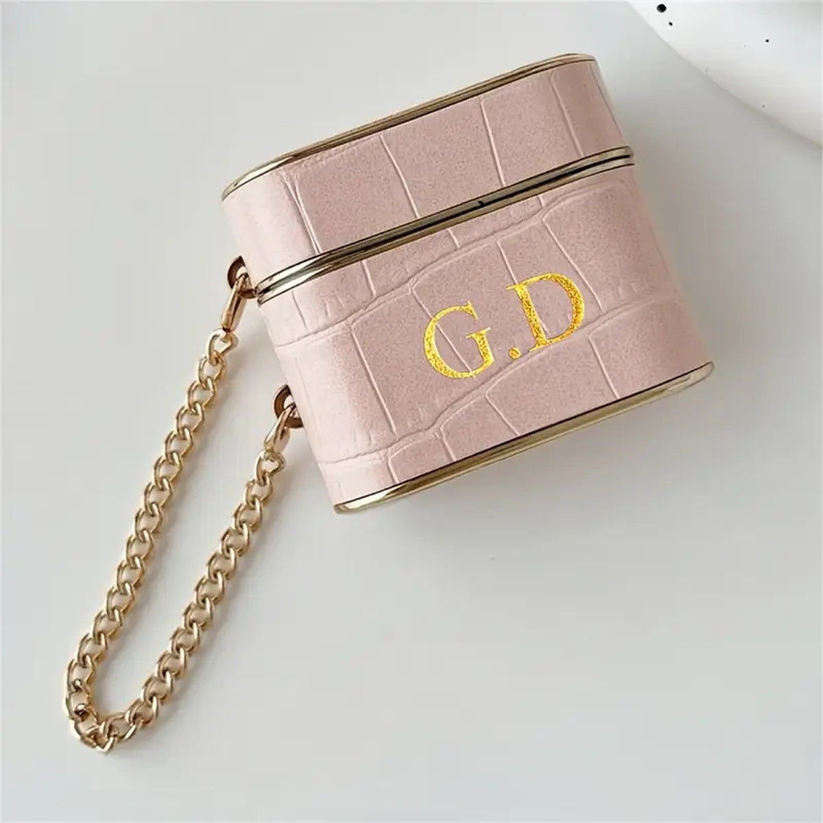 Capa AirPods Croc com detalhe dourado